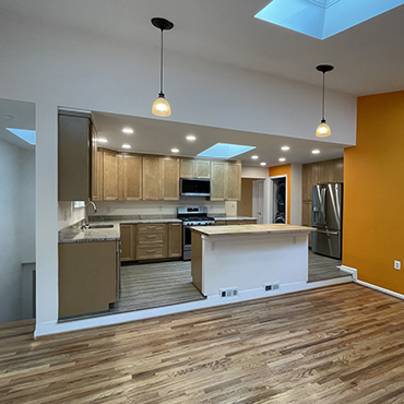 Kitchen remodel project, island, skylights, orange accent wall